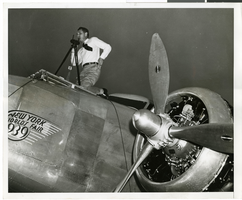 Photograph of Hiram "Tommy" Thurlow and the Lockheed 14, New York, New York, July 9, 1938