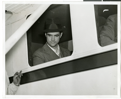 Photograph of Howard Hughes in the Lockheed 14, New York, July 10, 1938