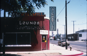 Slide of the Windmill Lounge and its neon signs, Lovelock, Nevada, 1986