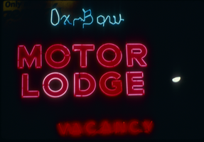 Slide of the neon sign for the Ox Bow Motor Lodge, Reno, Nevada, 1986
