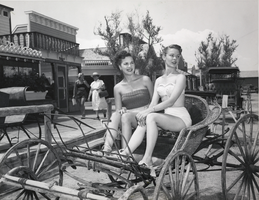 Photograph of two women sitting in a carriage at Last Frontier Village, Las Vegas, circa 1950s