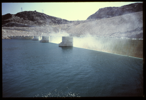 Water builds up along the Arizona spillway, looking north-northeast at Hoover Dam, Arizona: photographic slide