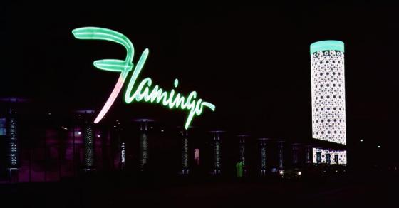 Night-time view of the front of the Flamingo Hotel and its Champagne Tower