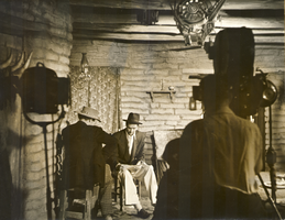 Photograph of Walter Huston and Howard Hughes on the set of The Outlaw, Hollywood, circa 1941