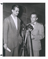 Photograph of Howard Hughes with a reporter, New York, July, 1947