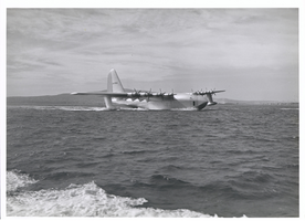 Photograph of the Hughes Flying Boat skimming the water in the Los Angeles Harbor, November 2, 1947