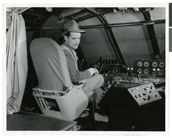Photograph of Howard Hughes in the cockpit of the Flying Boat, Los Angeles Harbor, November 1, 1947