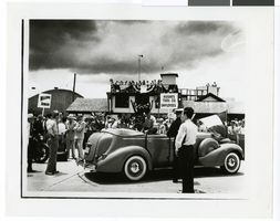 Photograph of Hughes Tool Company employees welcoming Howard Hughes, Houston, Texas, July 30, 1938