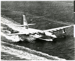 Aerial photograph of the Hughes HK-1 Flying Boat on its test flight in the Los Angeles Harbor, November 2, 1947