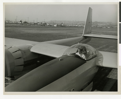 Photograph of Howard Hughes in the cockpit of the first XF-11, Culver City, California, 1946