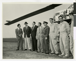 Photograph of Howard Hughes and others with the XH-17 helicopter, Culver City, California, October 23, 1952