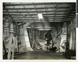 Photograph of workmen completing the final arrangements for the test of the HK-1, Hughes Flying Boat, November 2, 1947