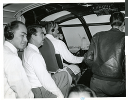 Photograph of Howard Hughes and crew in the cockpit of the Hughes Flying Boat, November 2, 1947