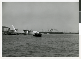 Photograph of the Hughes Flying Boat at its dock on Terminal Island in the Los Angeles Harbor, October 31, 1947