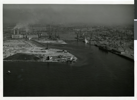 Aerial photograph of Terminal Island with the Hughes Flying Boat, Los Angeles Harbor, October 31, 1947