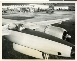 Photograph of Howard Hughes in the XF-11, after his successful test flight, April 5, 1947