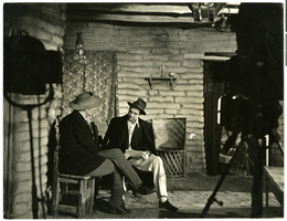 Photograph of Howard Hughes with Walter Huston on the set of The Outlaw, Hollywood, circa 1941