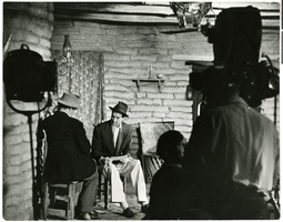 Photograph of Howard Hughes with Walter Huston on the set of The Outlaw, Hollywood, circa 1941