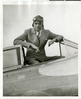 Photograph of Howard Hughes in his plane, January 1936