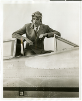 Photograph of Howard Hughes in his plane, January 1936