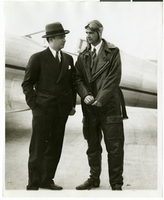 Photograph of Howard Hughes and Albert Lodwick beside the Northrop Gamma racer, 1936