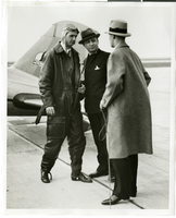Photograph of Howard Hughes, Albert Lodwick, and unidentified man at Floyd Bennett Field, New York, April 21, 1936