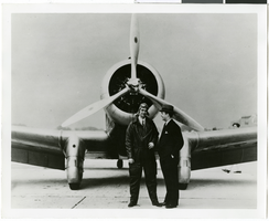 Photograph of Howard Hughes and Albert Lodwick in front of the Northrop Gamma racer, 1936