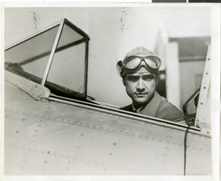 Photograph of Howard Hughes inside an unidentified plane, circa 1937