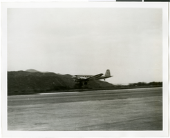 Photograph of airplane taking off, 1930-1950