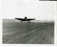Photograph of Hughes Racer landing after historic flight, Newark (N.J.), January 19, 1937
