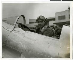 Photograph of Hughes after record-breaking flight, Newark (N.J.), January 19, 1937