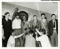 Photograph of Howard Hughes and his crew, July 10, 1938
