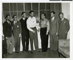 Photograph of Howard Hughes and other men, New York, July 14, 1938