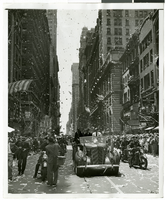 Photograph of Howard Hughes and his crew at a parade, New York, July 15, 1938