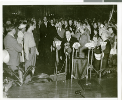 Photograph of Howard Hughes arriving at City Hall, New York City, July 15, 1938