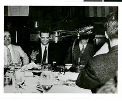 Photograph of Frank L. Shaw, Howard Hughes, and Frank Merriam at a banquet in Los Angeles, August 1, 1938
