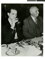 Photograph of Howard Hughes and Frank Merriam at a banquet in Los Angeles, August 1, 1938