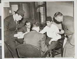 Photograph of Howard Hughes and other men, circa 1938