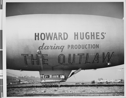 Photograph of a blimp advertising Hughes' "The Outlaw," circa 1946