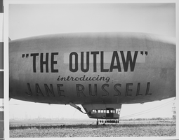 Photograph of a blimp advertising Hughes' "The Outlaw," circa 1946