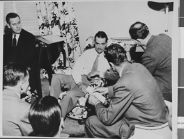 Photograph of Howard Hughes speaking to the press, Culver City, California, July 30, 1947
