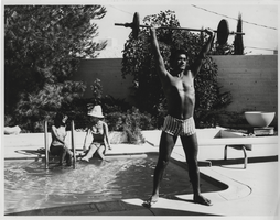 Photograph of Vassili Sulich, Marcella Hude and Evelyn Kitt, at Sulich's pool, Las Vegas, Nevada, 1960s