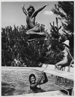 Photograph of Vassili Sulich, Marcella Hude and Evelyn Kitt, at Sulich's pool, Las Vegas, Nevada, 1960s