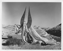 Photograph of Corrine Vial and Mary Smith posing in "Pavane for a Showgirl" in the desert in southern Nevada, 1960s