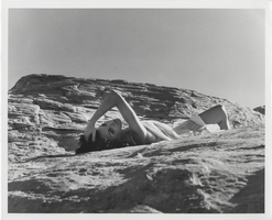 Photograph of Mary Smith posing in "Pavane for a Showgirl" in the desert in southern Nevada, 1960s