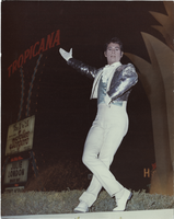 Photograph of Vassili Sulich posing in costume by the Tropicana Hotel marquee, Las Vegas, Nevada, 1960s