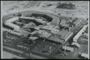 Black and white aerial view of the Dunes Hotel.