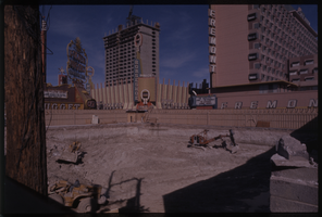 Color view of a construction site. The Golden Nugget, Binion's Horseshoe, and Fremont are visible in the background.
