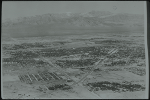 Black & white aerial view of Las Vegas. Mount Charleston is visible in the background.