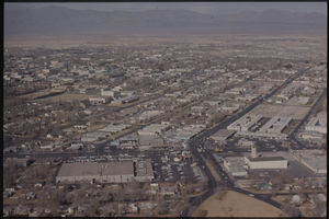 Color aerial view of Las Vegas. The Huntridge Theater (South East corner of Charleston Boulevard and Maryland Parkway) is visible in the lower right-hand corner.